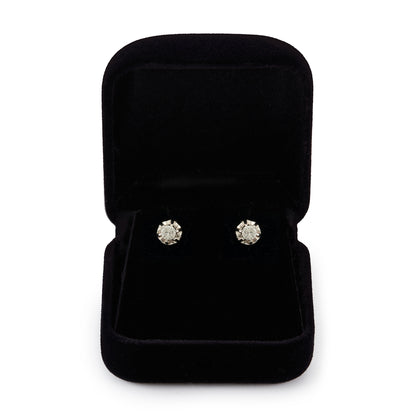 Classic 18ct white gold stud earrings, each with a 0.20ct diamond in a six claw setting. Argentina.
