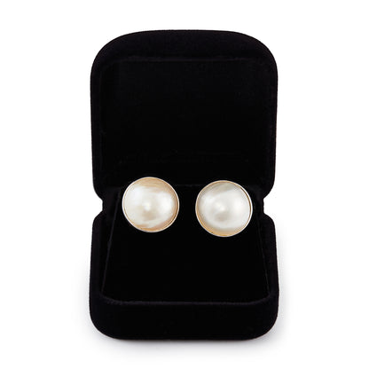 Classic 18ct white gold stud earrings, each set with a lustrous mabé pearl.