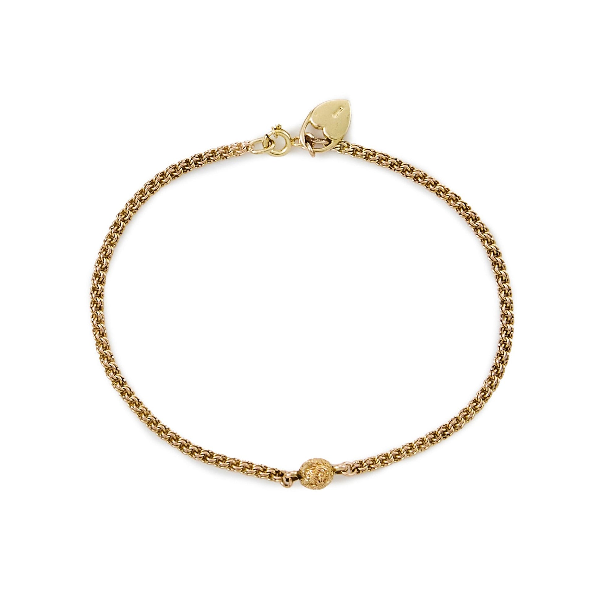 Delicate vintage 18ct gold Albertina bracelet, with a beautifully engraved ball and a heart shaped charm.