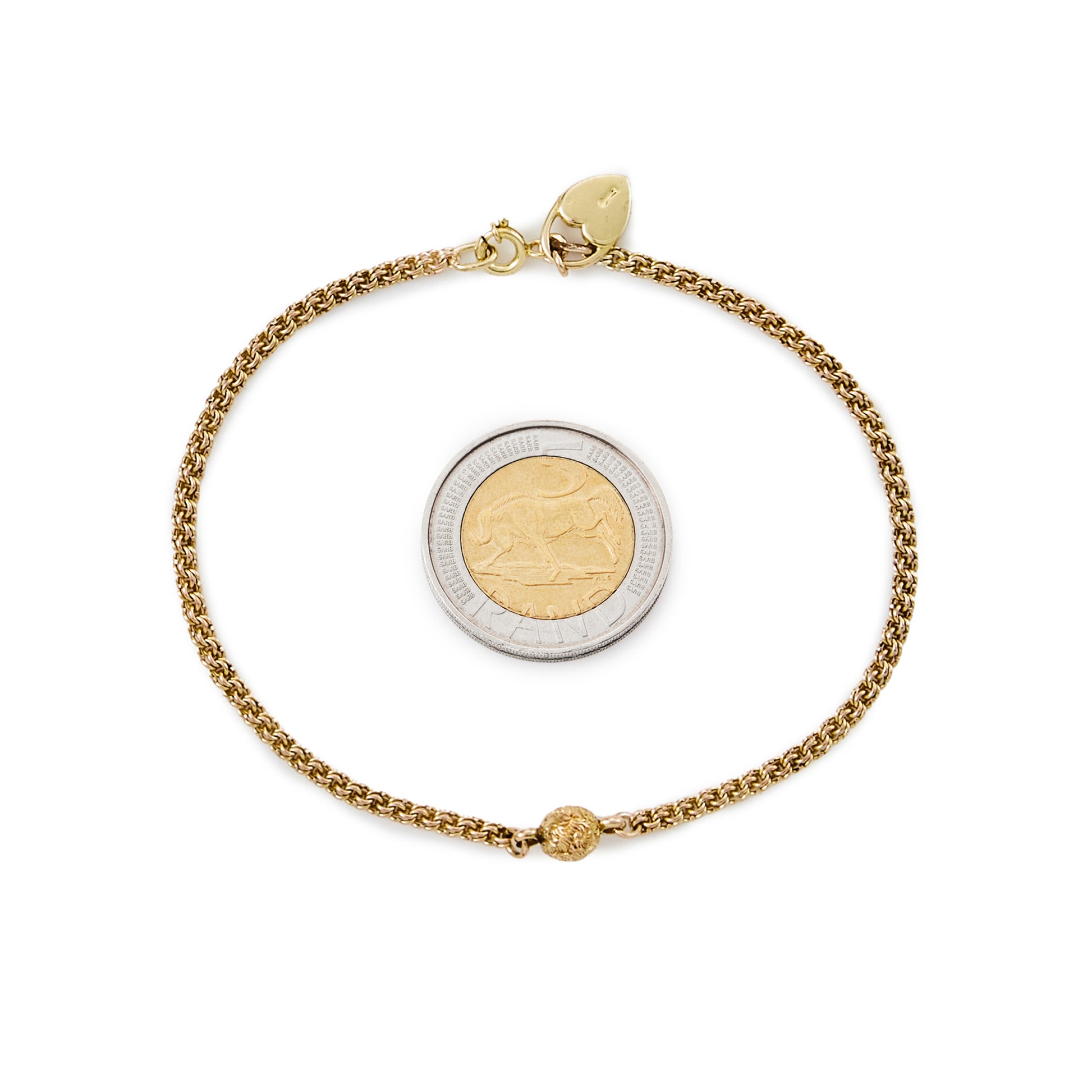 Delicate vintage 18ct gold Albertina bracelet, with a beautifully engraved ball and a heart shaped charm.