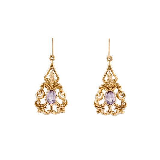 Lovely 9ct yellow gold ornate drop earrings, each set with a light-purple faceted oval amethyst. Circa 1940’s