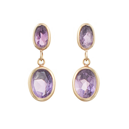 Dainty vintage 9ct gold drop earrings, each with two tube-set faceted purple amethyst stones.