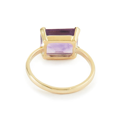 Classic 9ct yellow gold ring with a rectangular, beautifully faceted amethyst in a claw setting.