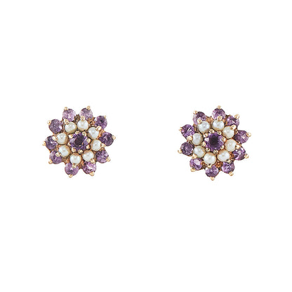 Pretty 9ct gold stud earrings, with beautifully faceted amethysts and seed pearls which are claw-set in the shape of a flower.
