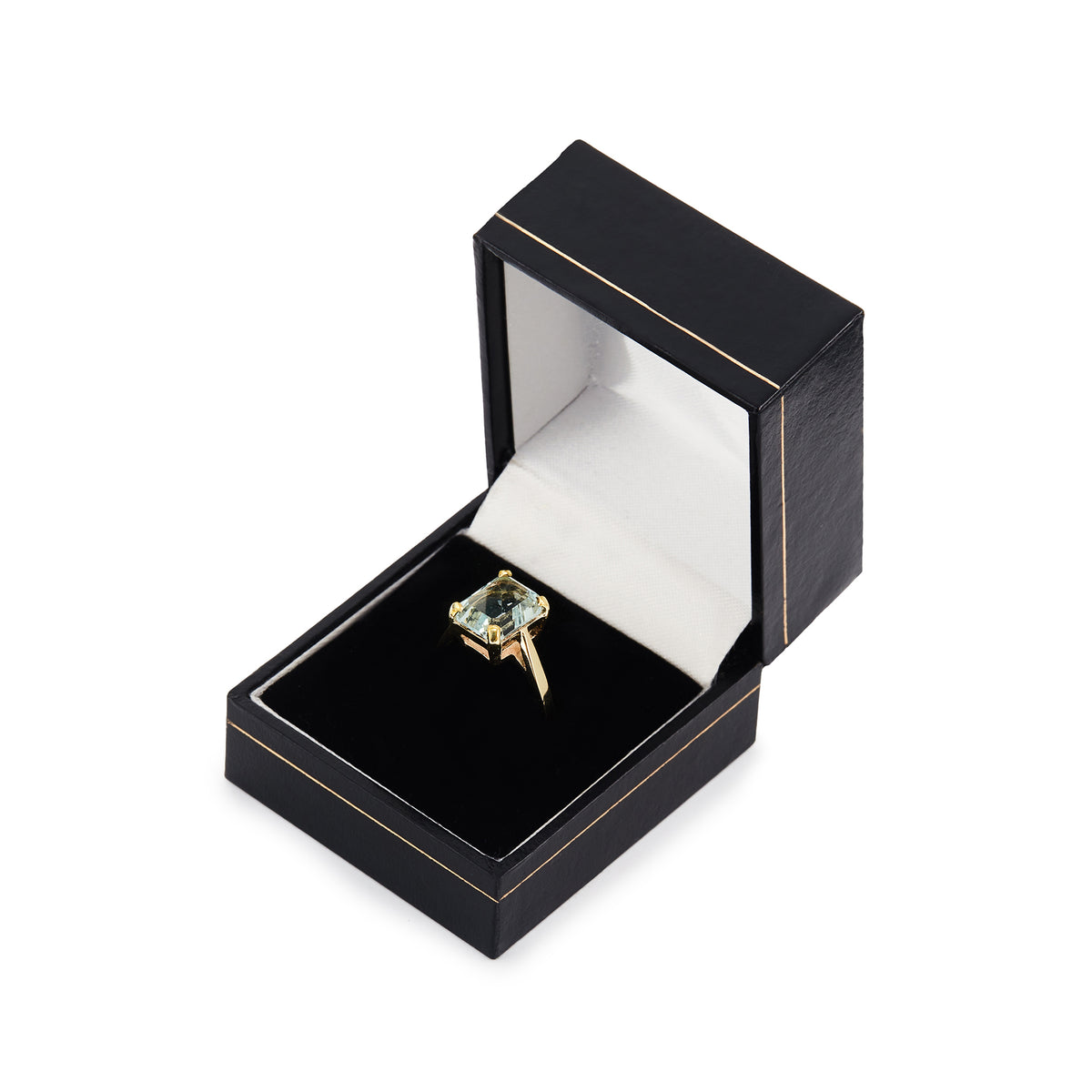 Elegant vintage 9ct gold ring with a beautifully faceted light blue +-2.5ct emerald-cut aquamarine in a four-prong setting.