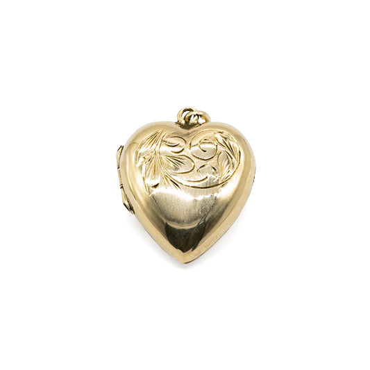 Lovely 9ct gold back and front beautifully engraved, heart shaped locket.