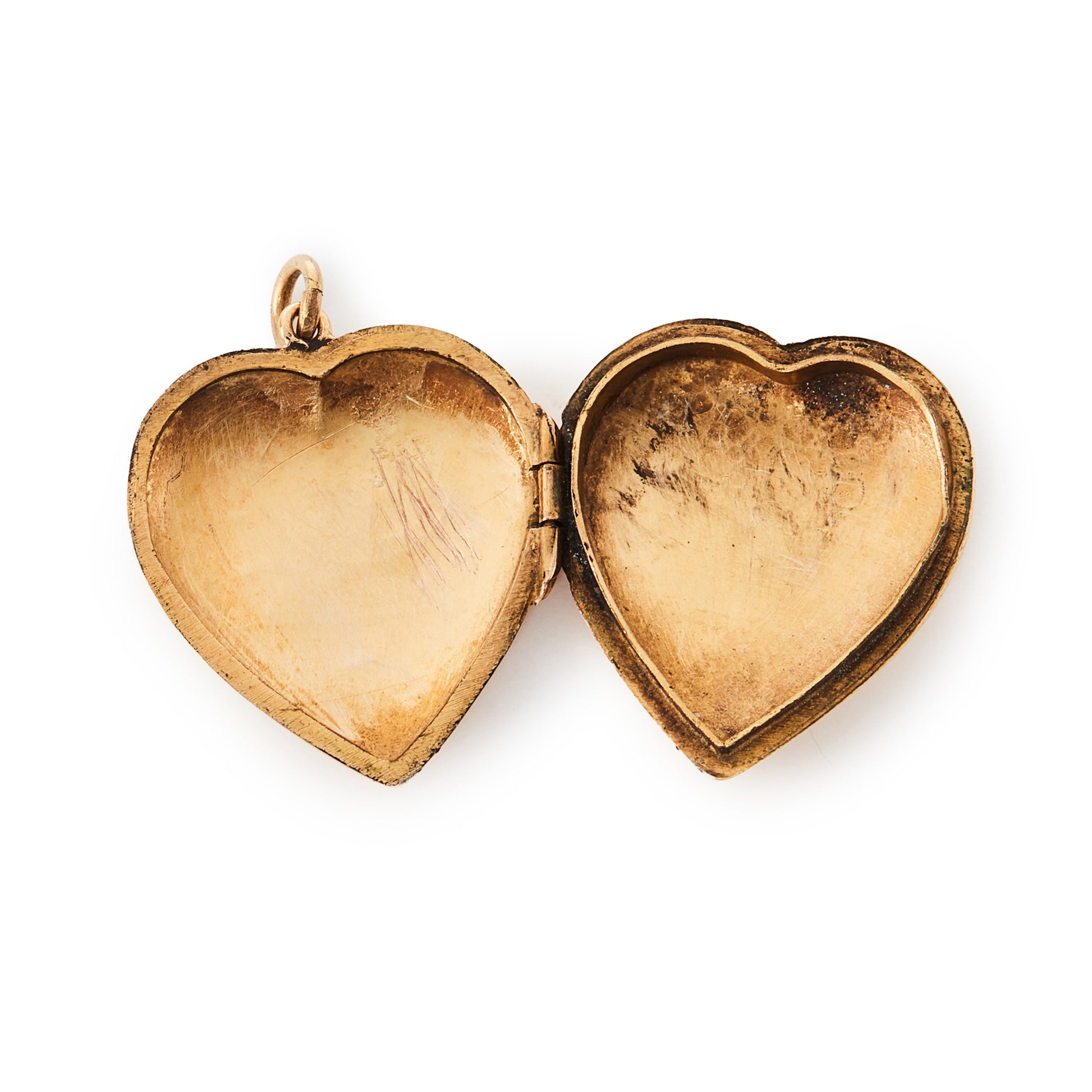 Beautifully engraved 9ct gold back and front heart shaped locket. Circa 1930’s