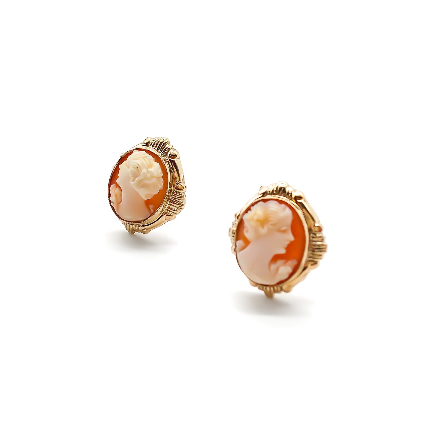 Lovely 9ct gold stud earrings, each set with a beautifully carved cameo.