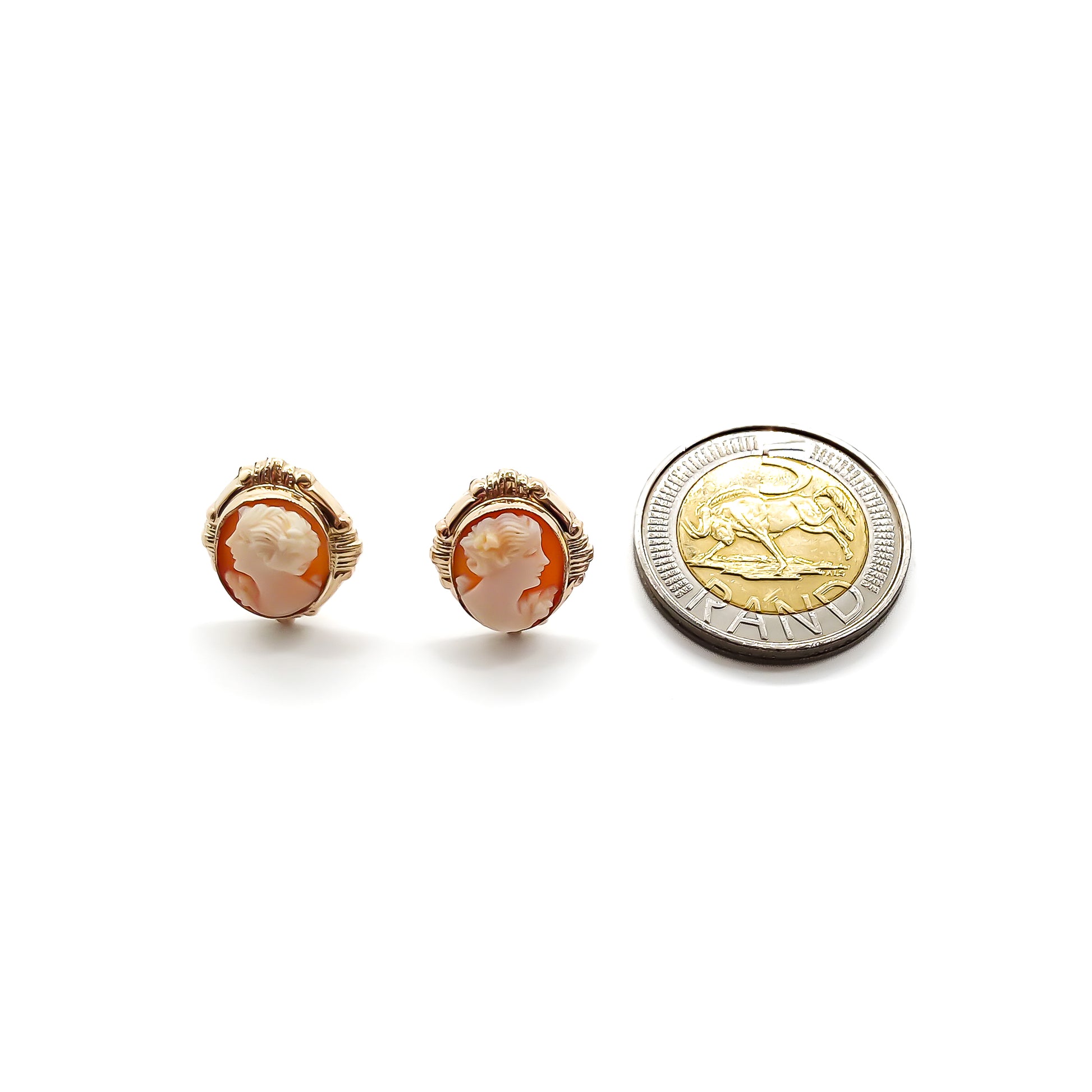 Lovely 9ct gold stud earrings, each set with a beautifully carved cameo.