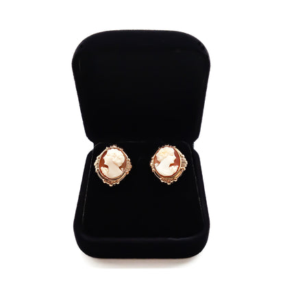 Lovely 9ct gold stud earrings, each set with a beautifully carved cameo.