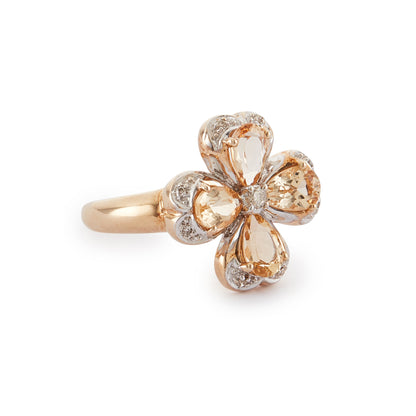 Charming 9ct gold ring set with beautifully faceted citrines and small diamonds in the shape of a four-leaf clover, a symbol of good luck and fortune.