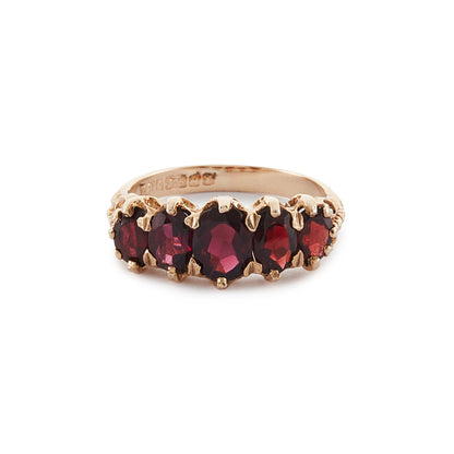 Classic vintage 9ct gold ring with five beautiful deep red garnets, each in a claw setting.