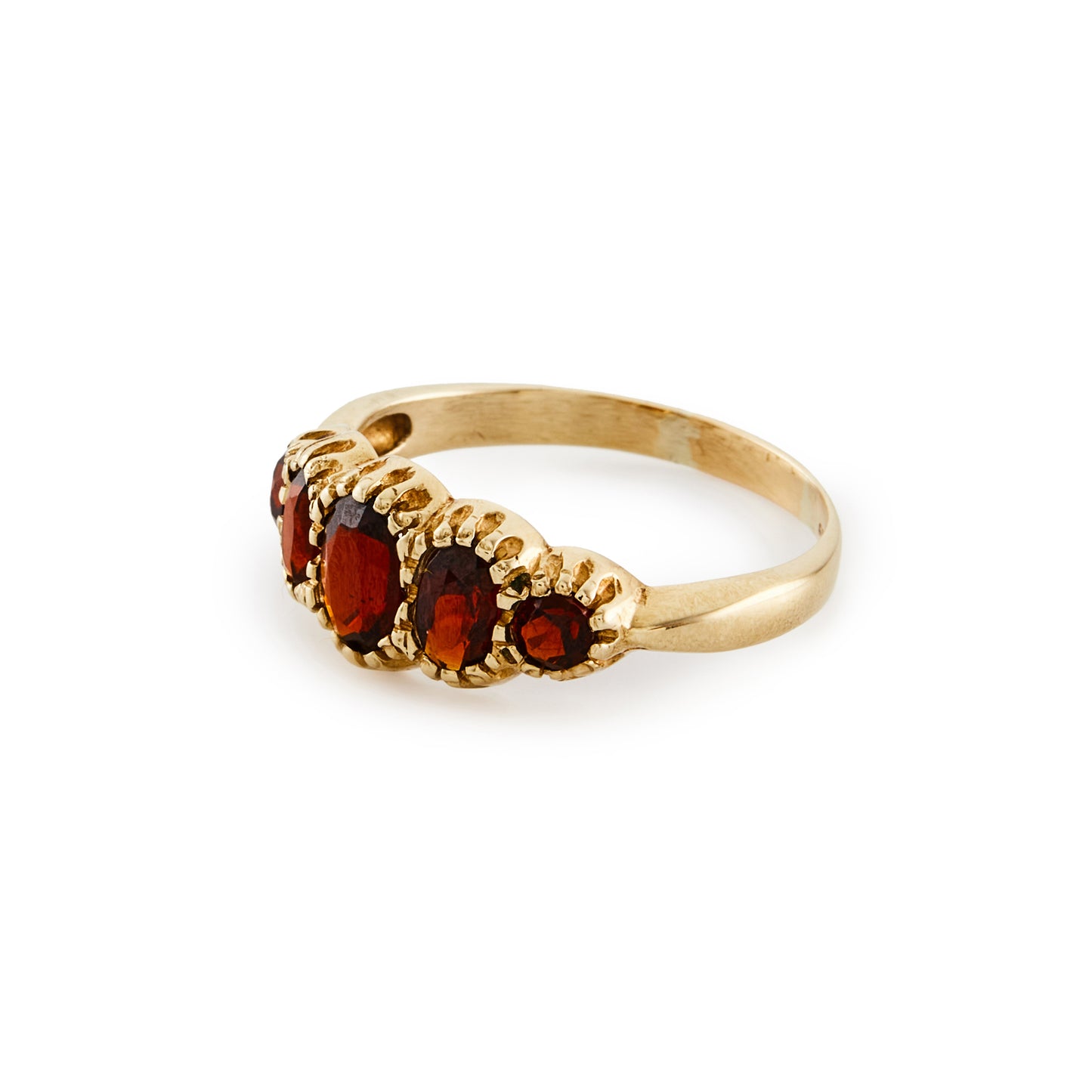 Lovely 9ct gold ring set with five beautifully faceted deep red oval garnets.