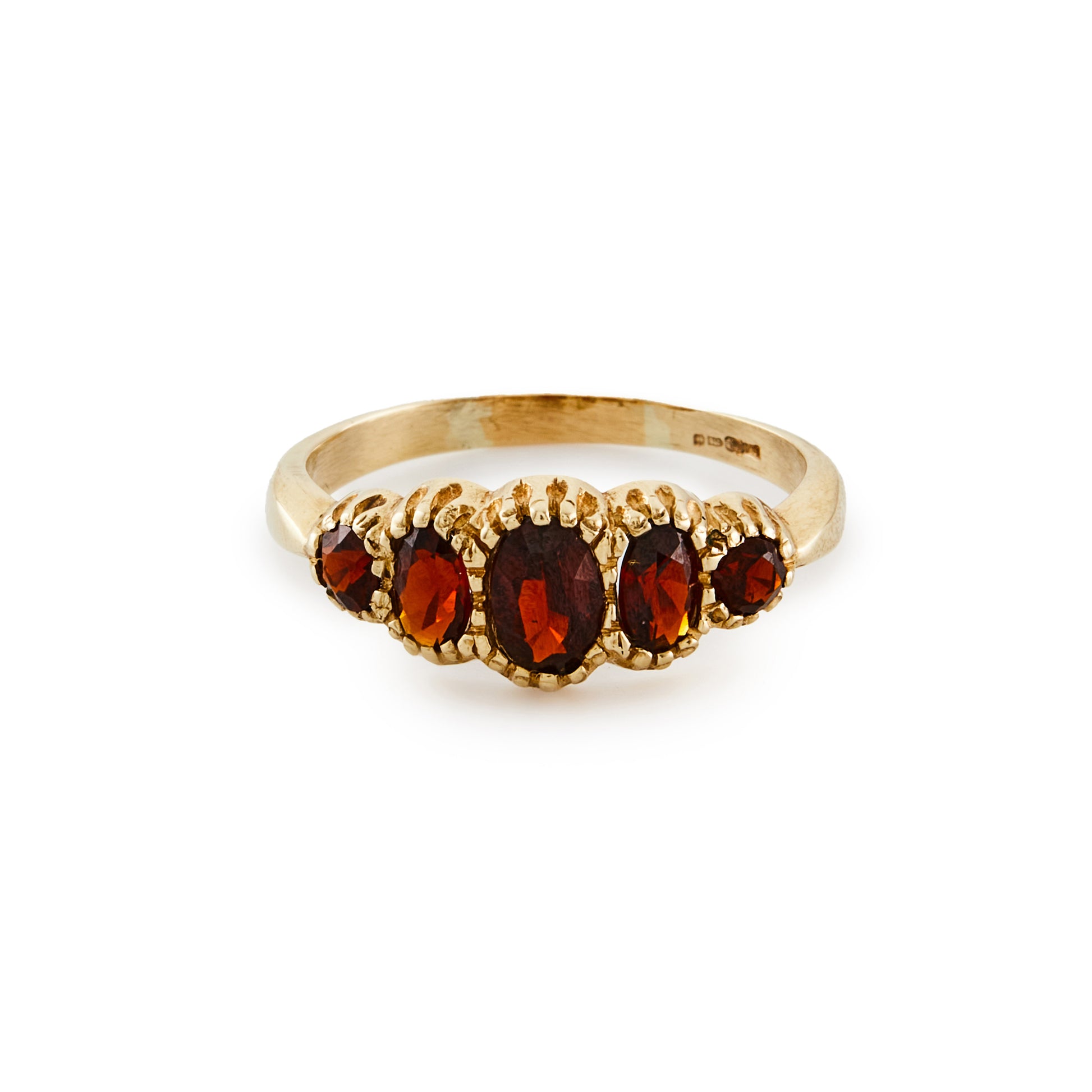 Lovely 9ct gold ring set with five beautifully faceted deep red oval garnets.