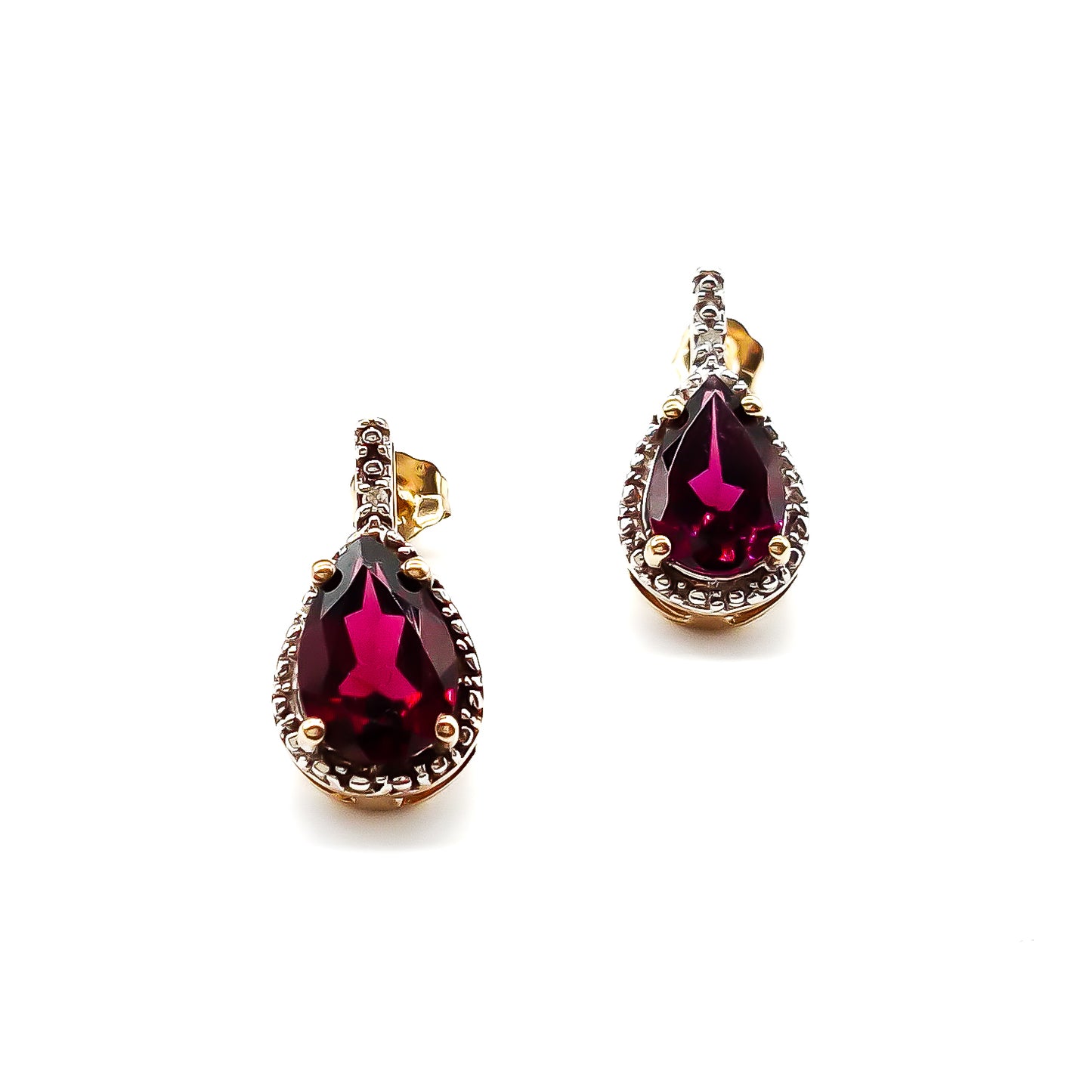 Classic 9ct gold stud earrings, each set with a deep red teardrop garnet in a diamond halo setting.