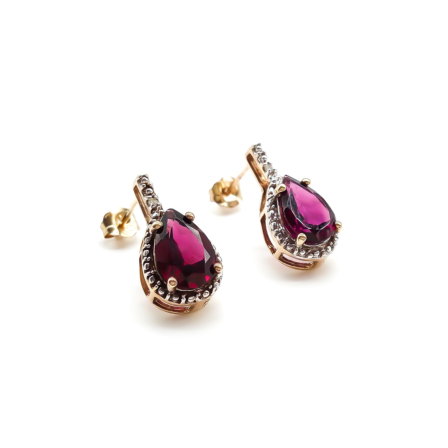 Classic 9ct gold stud earrings, each set with a deep red teardrop garnet in a diamond halo setting.