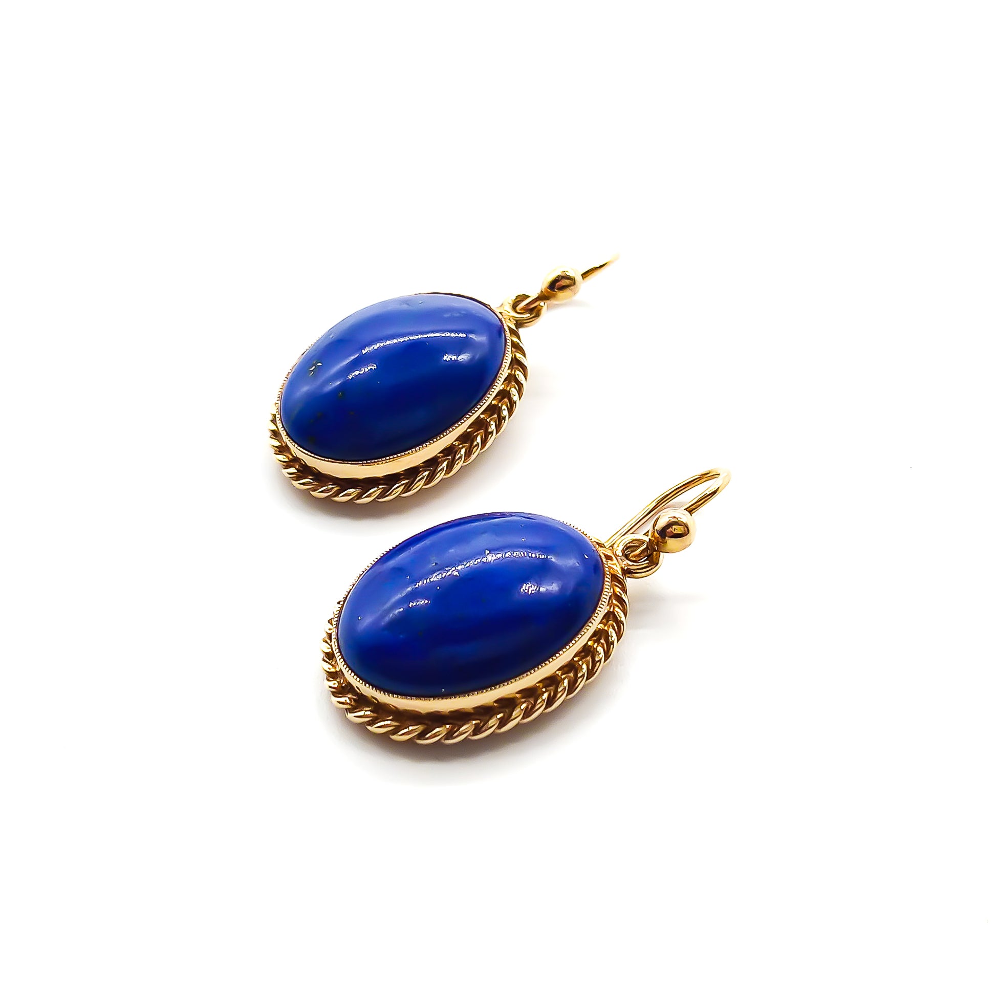 Lovely 9ct yellow gold earrings, each set with a deep blue lapis lazuli cabochon. Circa 1950’s