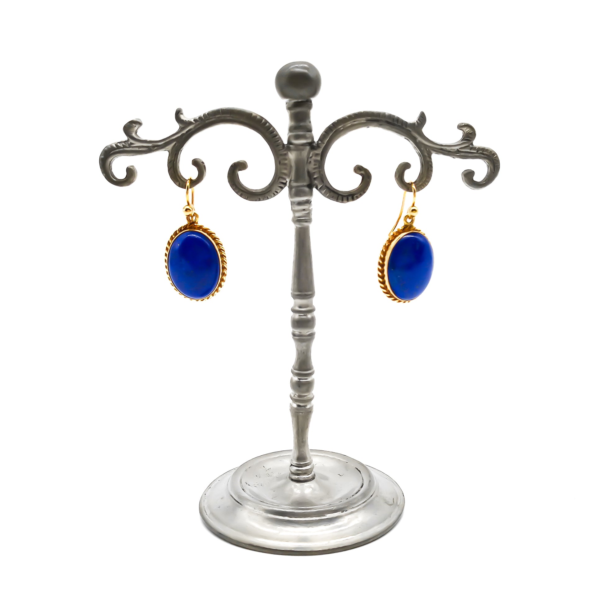 Lovely 9ct yellow gold earrings, each set with a deep blue lapis lazuli cabochon. Circa 1950’s