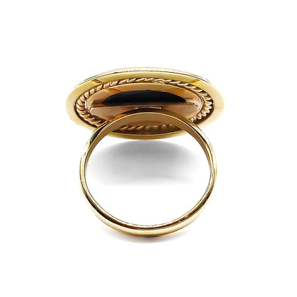 Classic 9ct gold ring set with a beautiful, deep blue lapis lazuli cabochon.