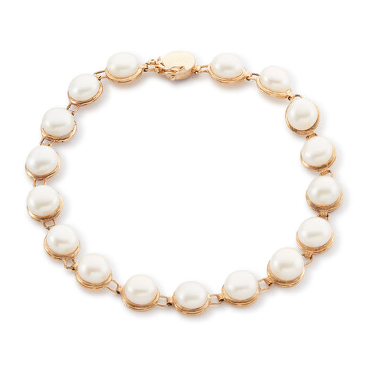 Lovely 9ct yellow gold bracelet set with seventeen lustrous button pearls.