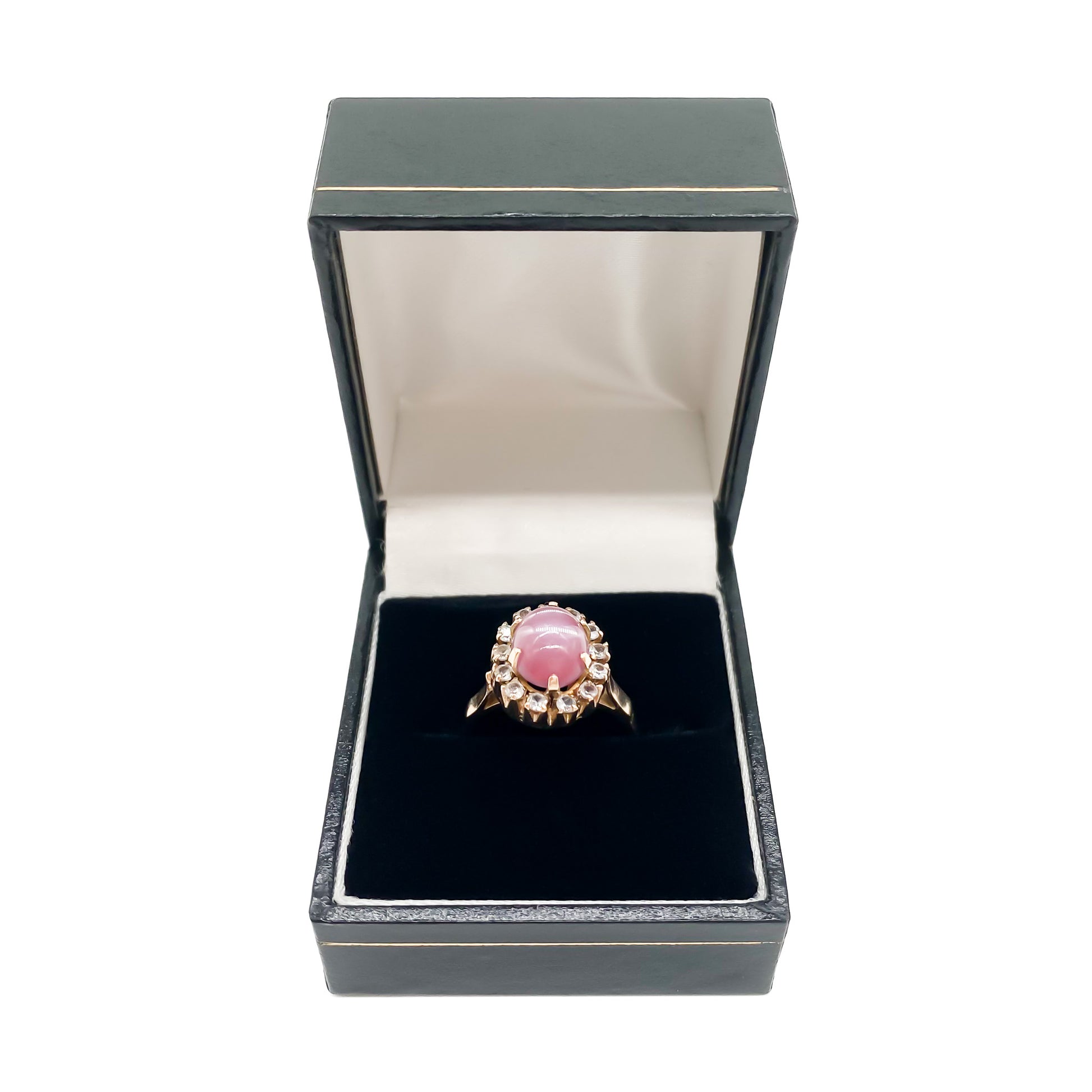 Lovely 9ct gold vintage ring set with an oval dusty pink quartz cabochon, surrounded by thirteen white faceted spinel stones.