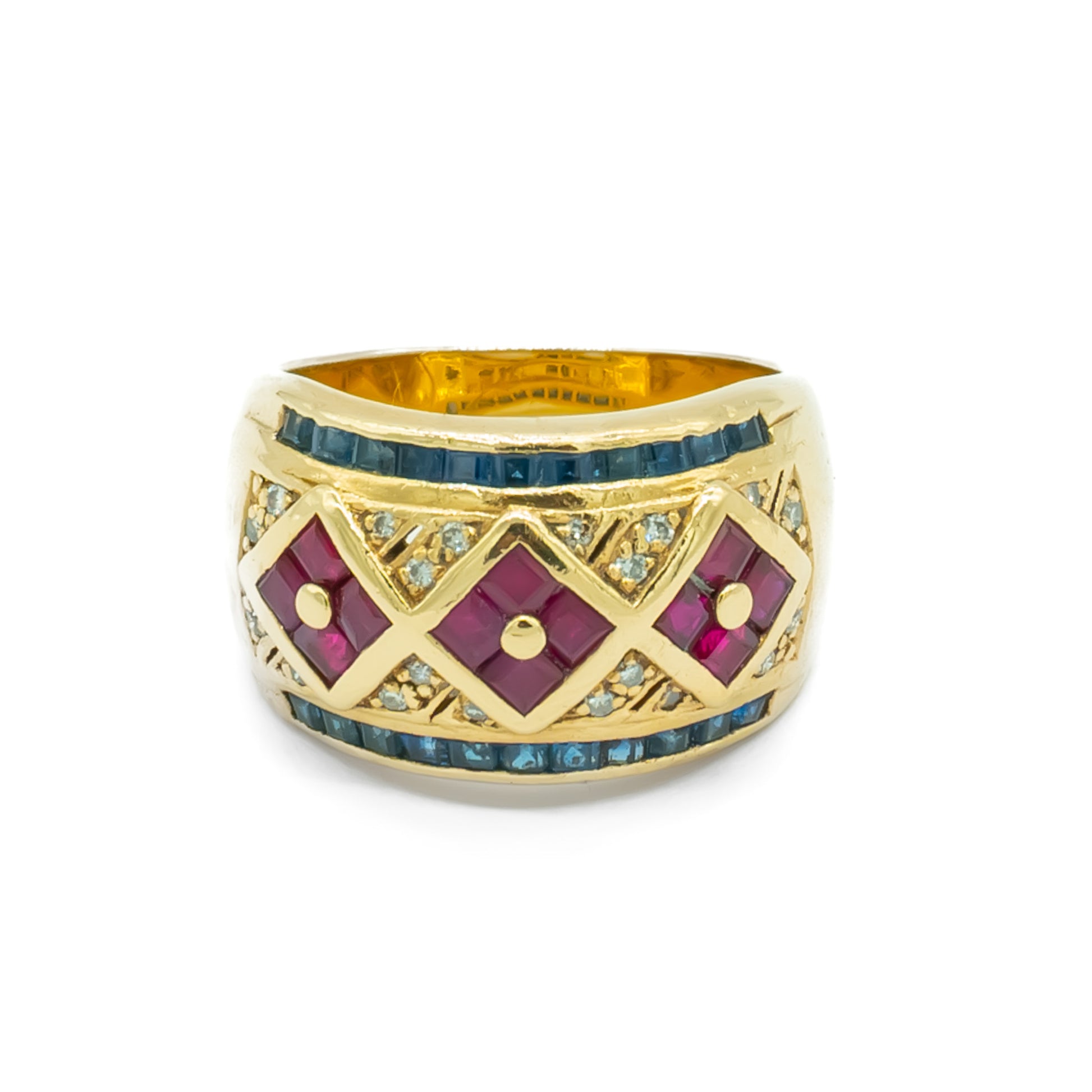 Stunning 9ct yellow gold ring set with twelve square rubies, twenty-two rectangular sapphires and twenty small diamonds.