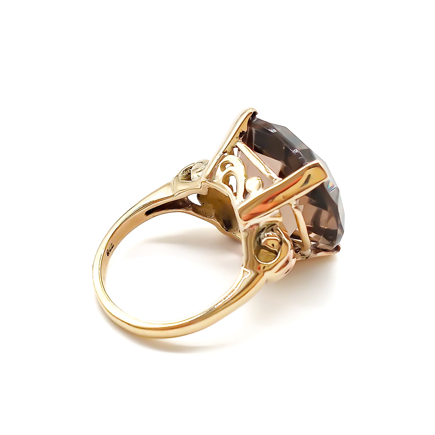 Classic 9ct yellow gold ring set with a beautifully faceted cushion-cut smoky quartz.