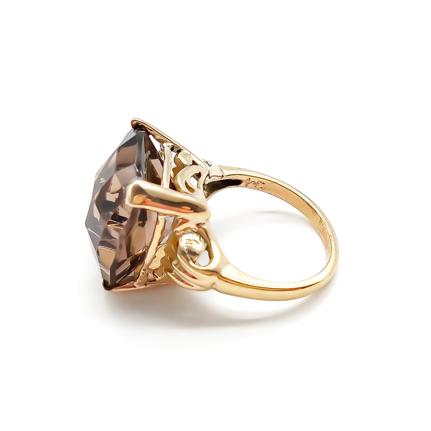 Classic 9ct yellow gold ring set with a beautifully faceted cushion-cut smoky quartz.