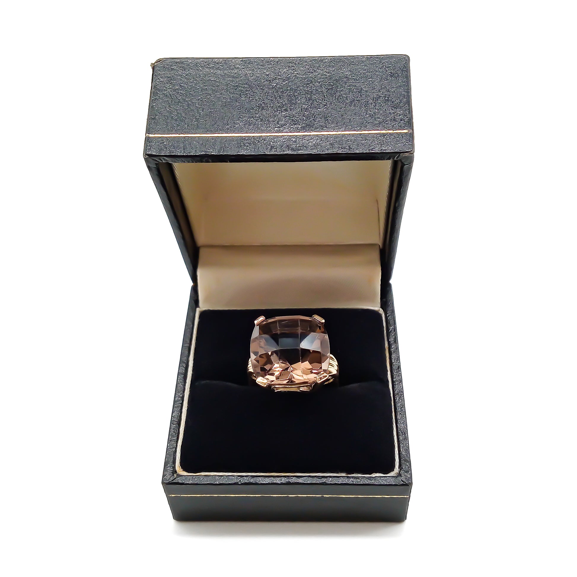 Classic 9ct yellow gold ring set with a beautifully faceted cushion-cut smoky quartz.