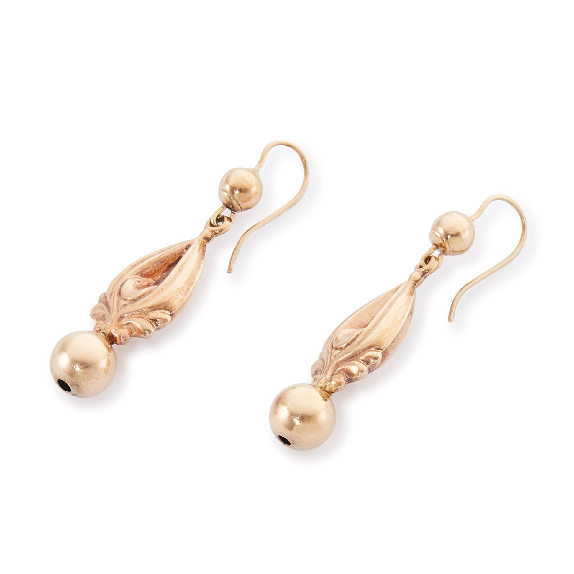 Ornate repoussé 9ct gold Victorian drop earrings. The earrings are hollow and therefore not heavy on the ear.