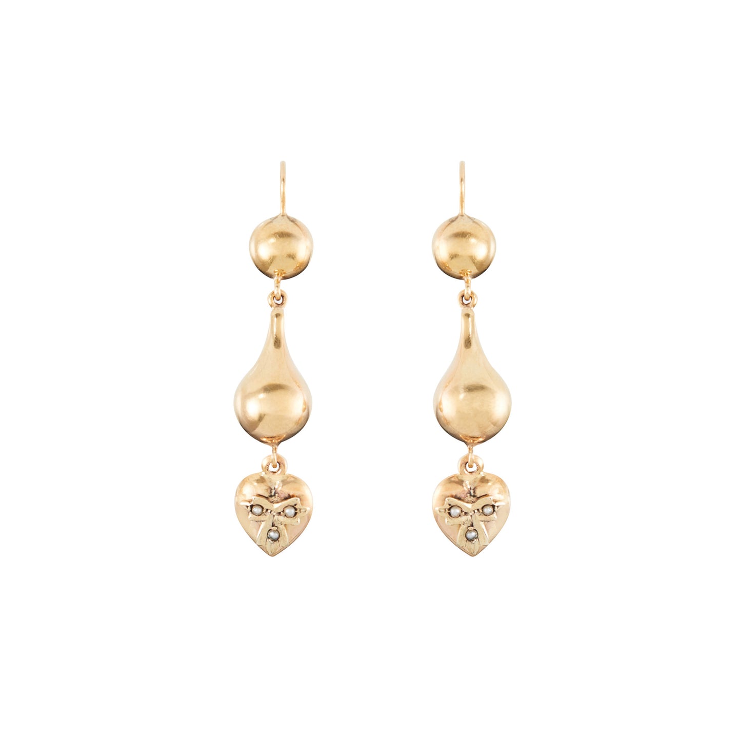 Stunning vintage 9ct yellow gold drop earrings, each with a dangling heart that is set with three seed pearls.