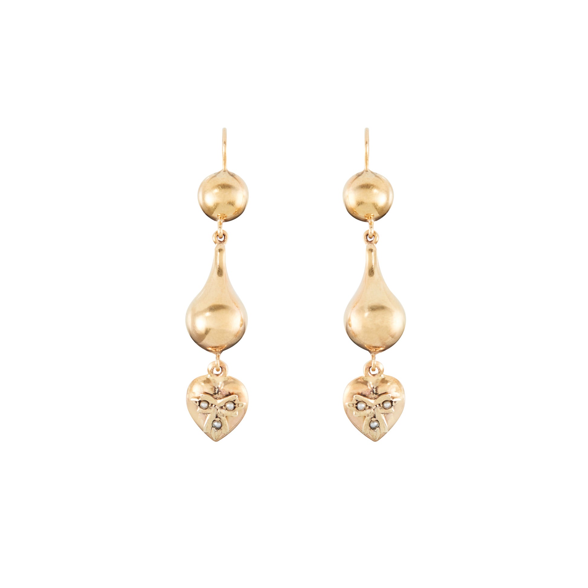 Stunning vintage 9ct yellow gold drop earrings, each with a dangling heart that is set with three seed pearls.