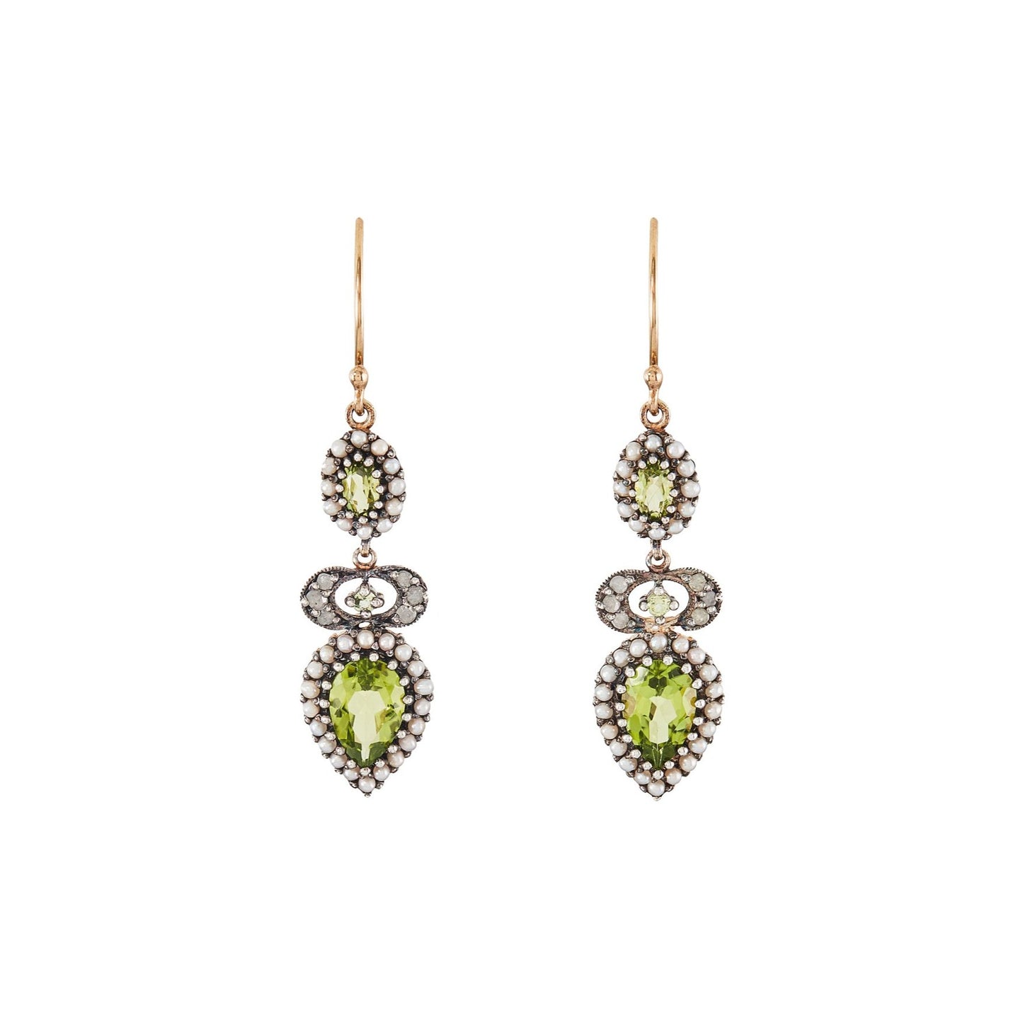 Exquisite vintage 9ct gold and silver drop earrings, each set with two bright green faceted peridots surrounded by seed pearls and one small peridot with three small mine cut diamonds on each side.