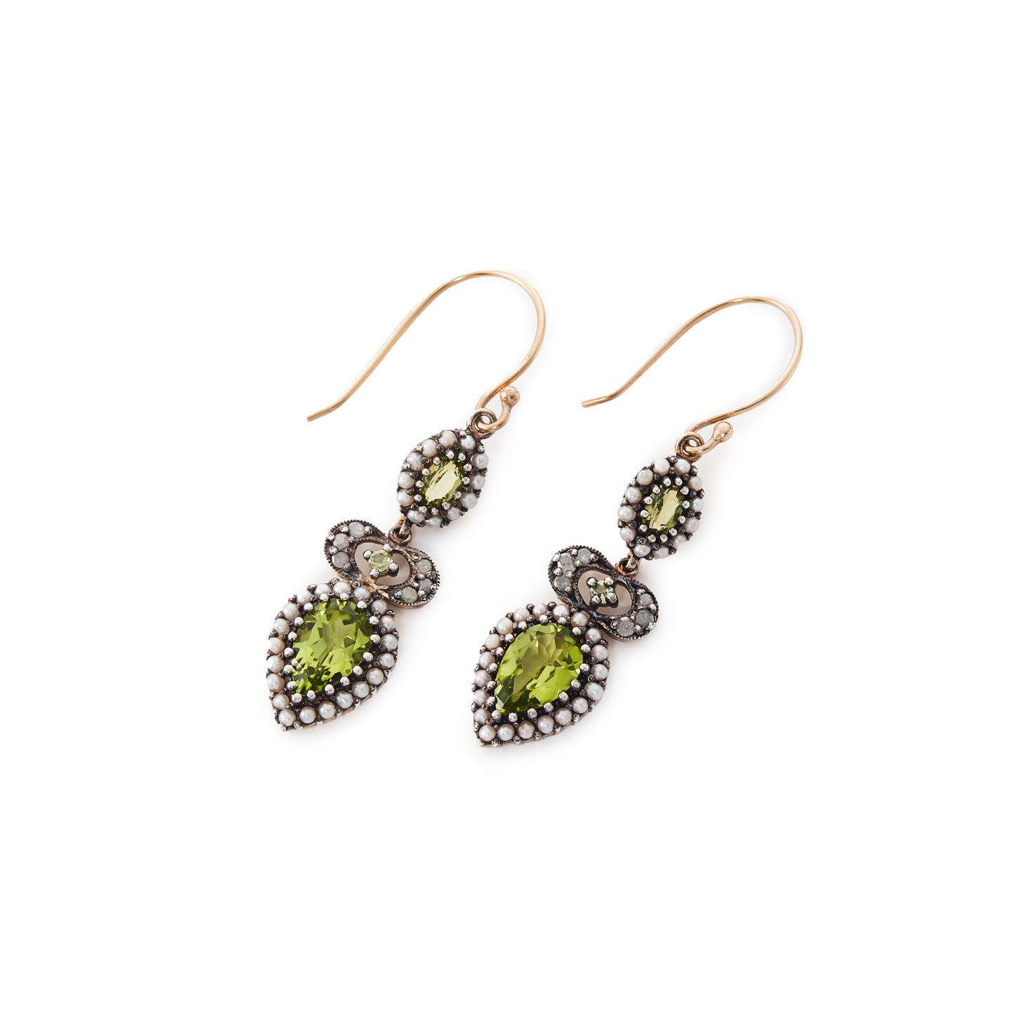 Exquisite vintage 9ct gold and silver drop earrings, each set with two bright green faceted peridots surrounded by seed pearls and one small peridot with three small mine cut diamonds on each side.