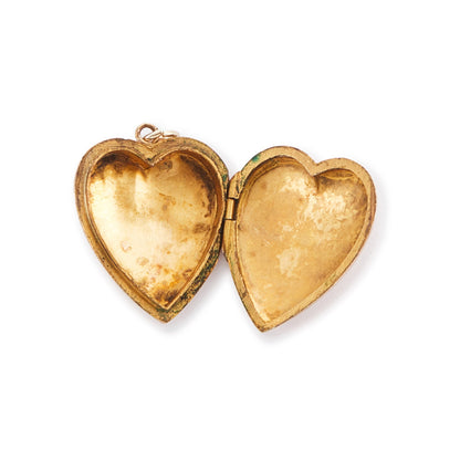 Lovely 9ct rose gold back and front locket with engraving on one side. The locket opens to take two photographs.