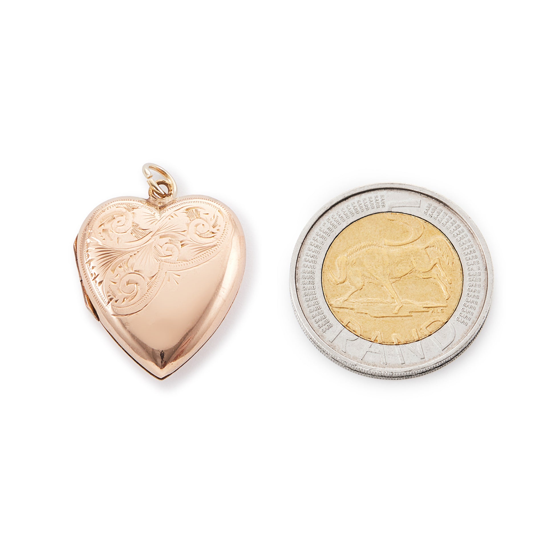 Lovely 9ct rose gold back and front locket with engraving on one side. The locket opens to take two photographs.