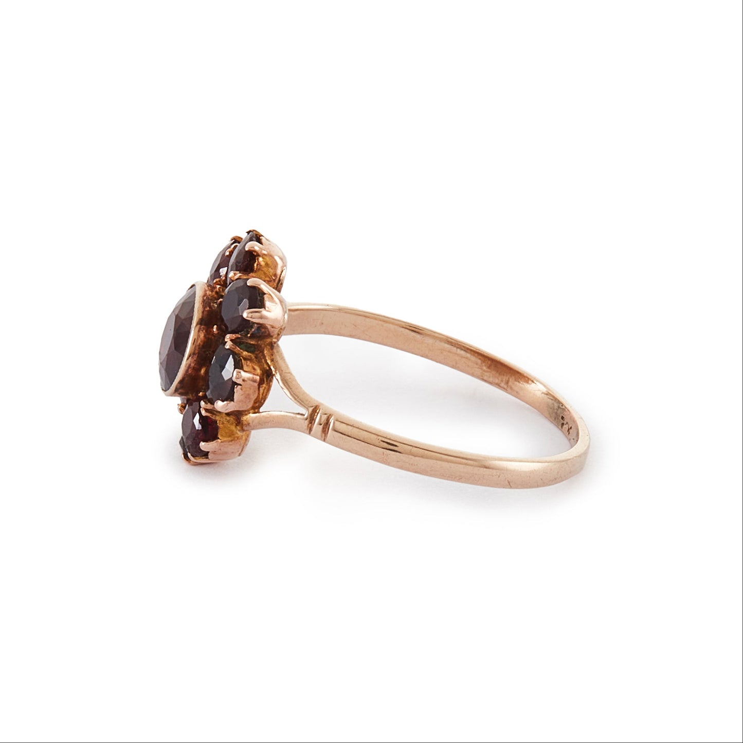 Lovely 9ct rose gold ring set with nine beautifully faceted Bohemian garnets in the shape of a flower.