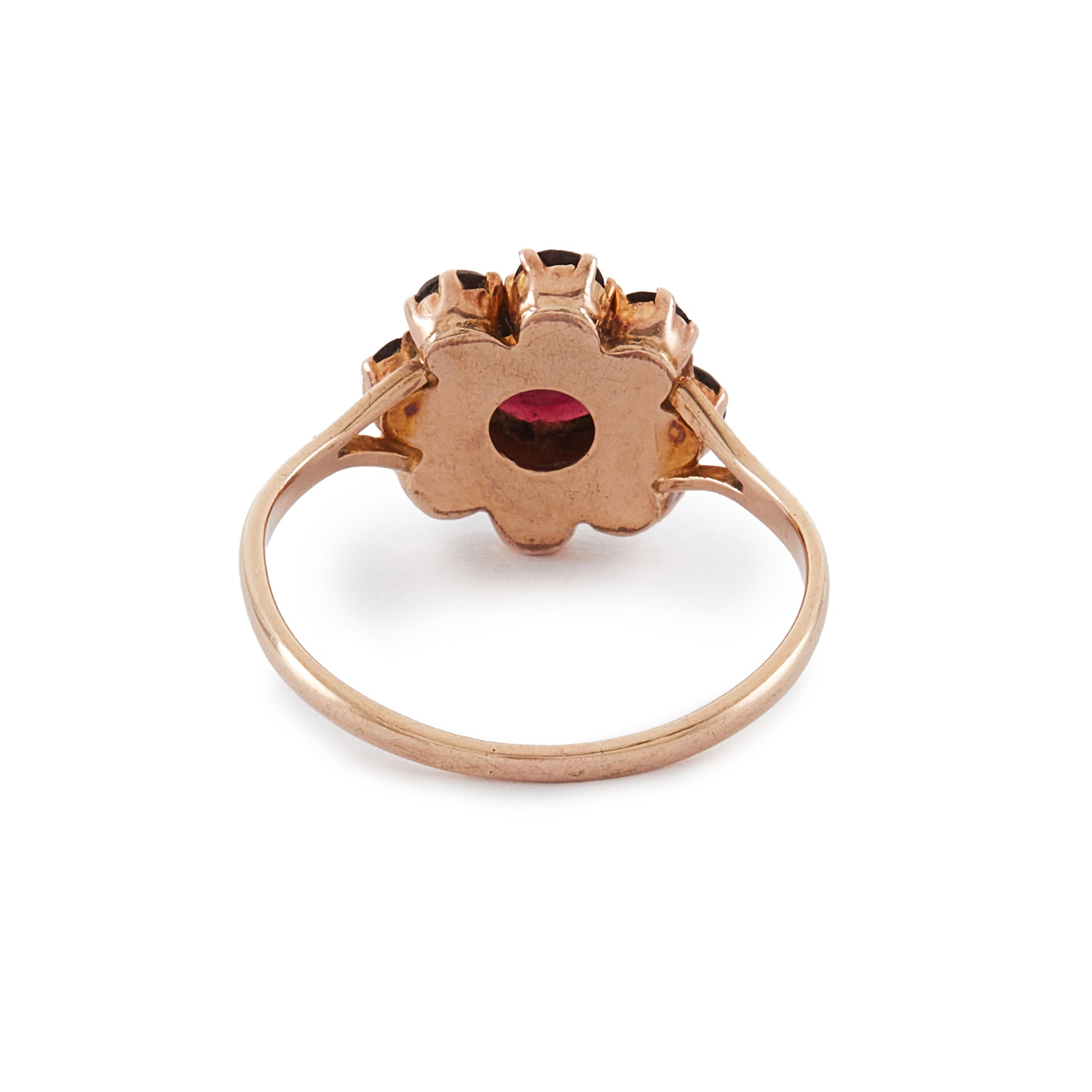 Lovely 9ct rose gold ring set with nine beautifully faceted Bohemian garnets in the shape of a flower.