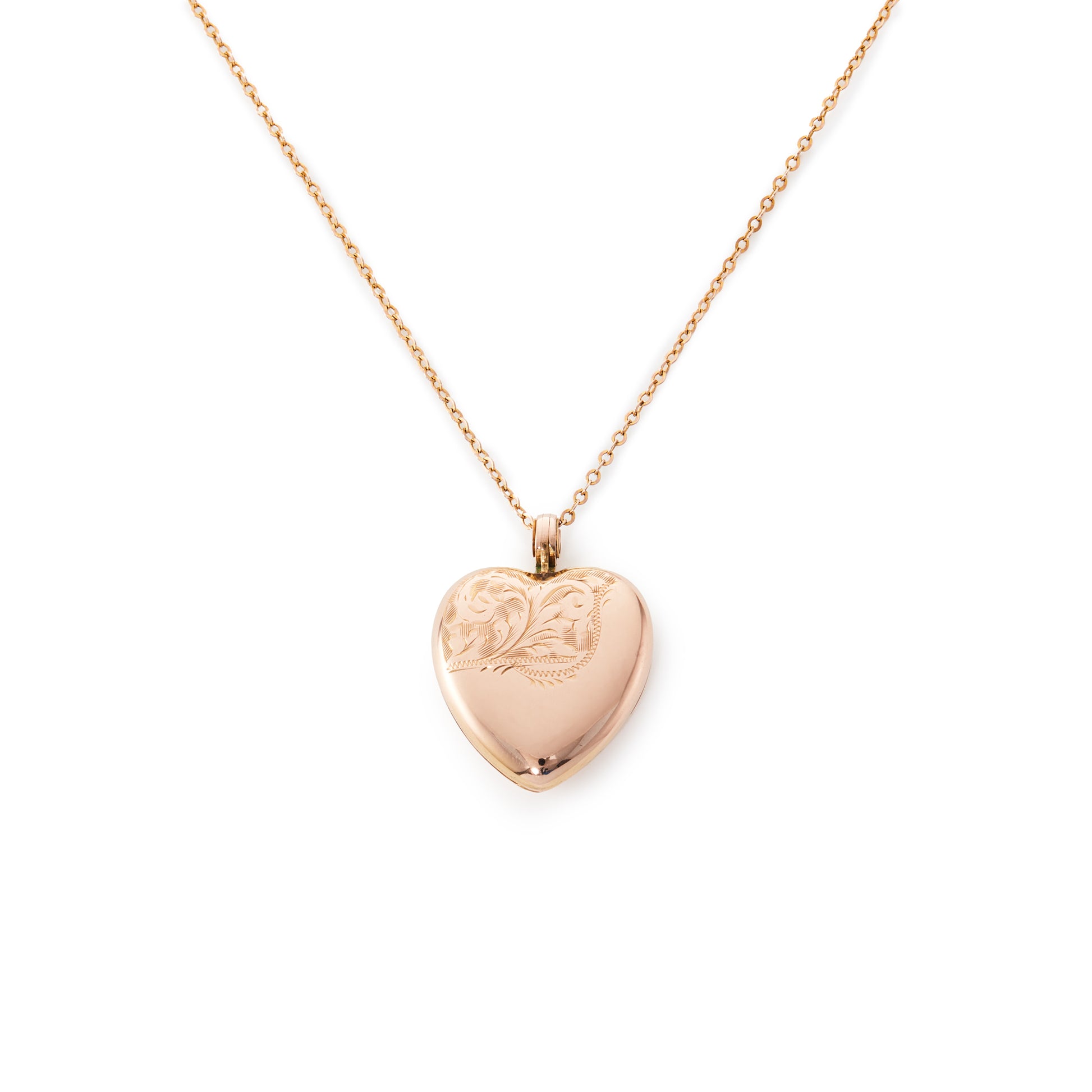 Beautifully engraved 9ct rose gold heart shaped locket on a 9ct belcher link chain. Chester 1953