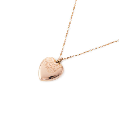 Beautifully engraved 9ct rose gold heart shaped locket on a 9ct belcher link chain. Chester 1953