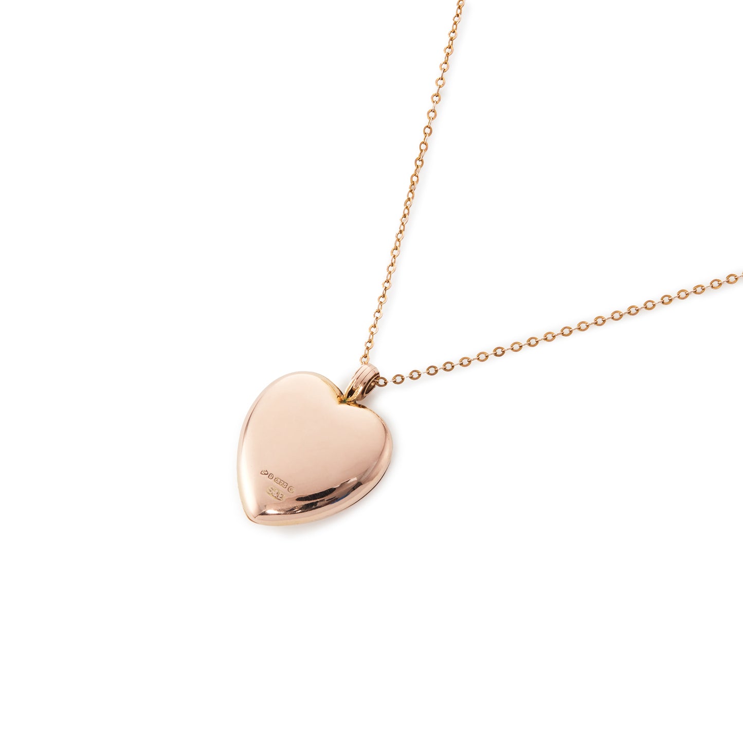 Beautifully engraved 9ct rose gold heart shaped locket on a 9ct belcher link chain. Chester 1953