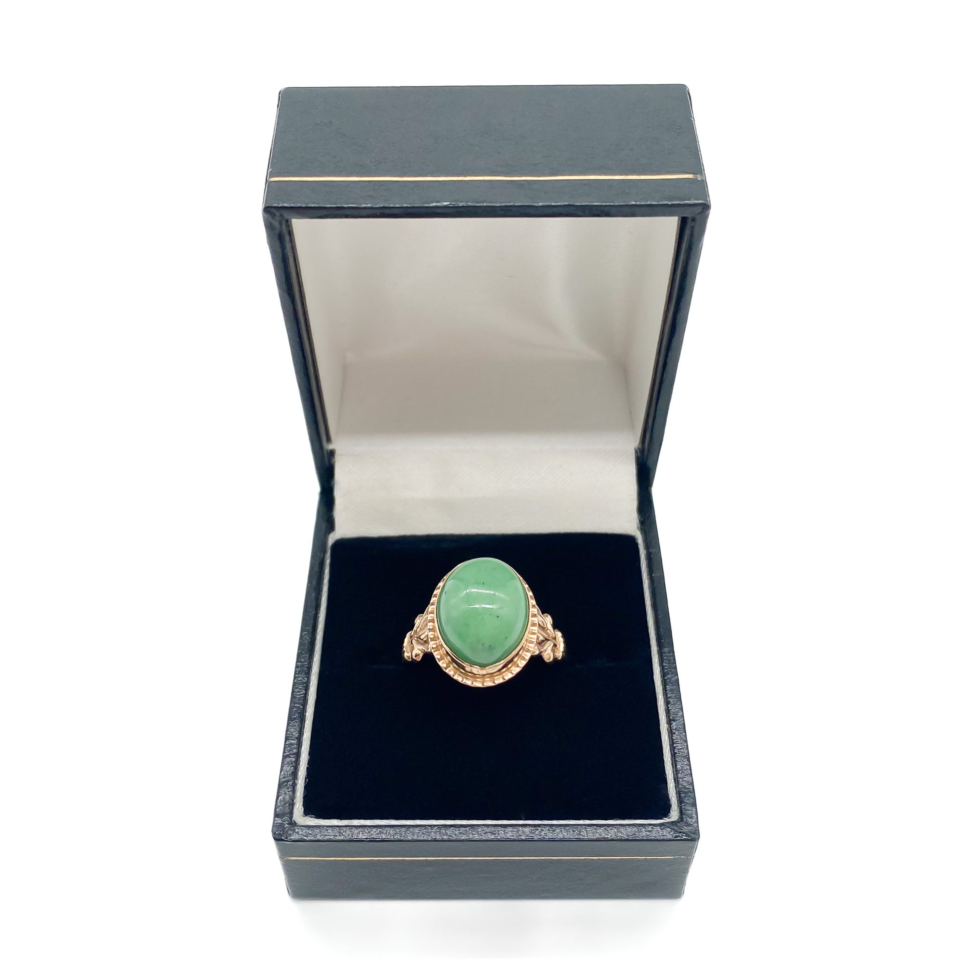 Charming 9ct rose gold ring set with a lovely green oval cabochon jade stone.