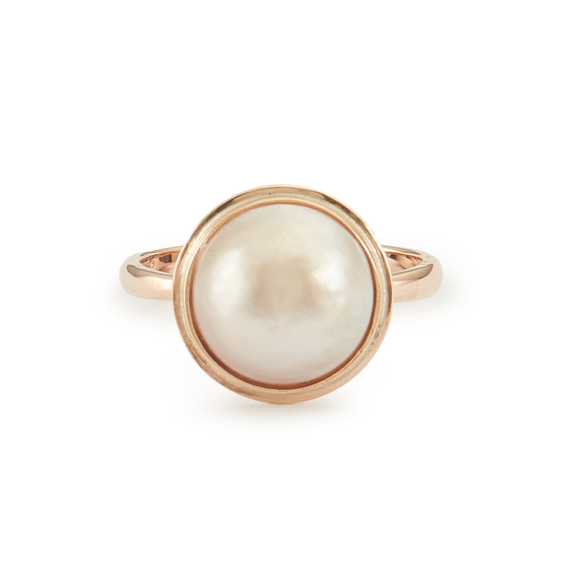 Classic 9ct rose gold ring with a lustrous mabe pearl in a tube setting.