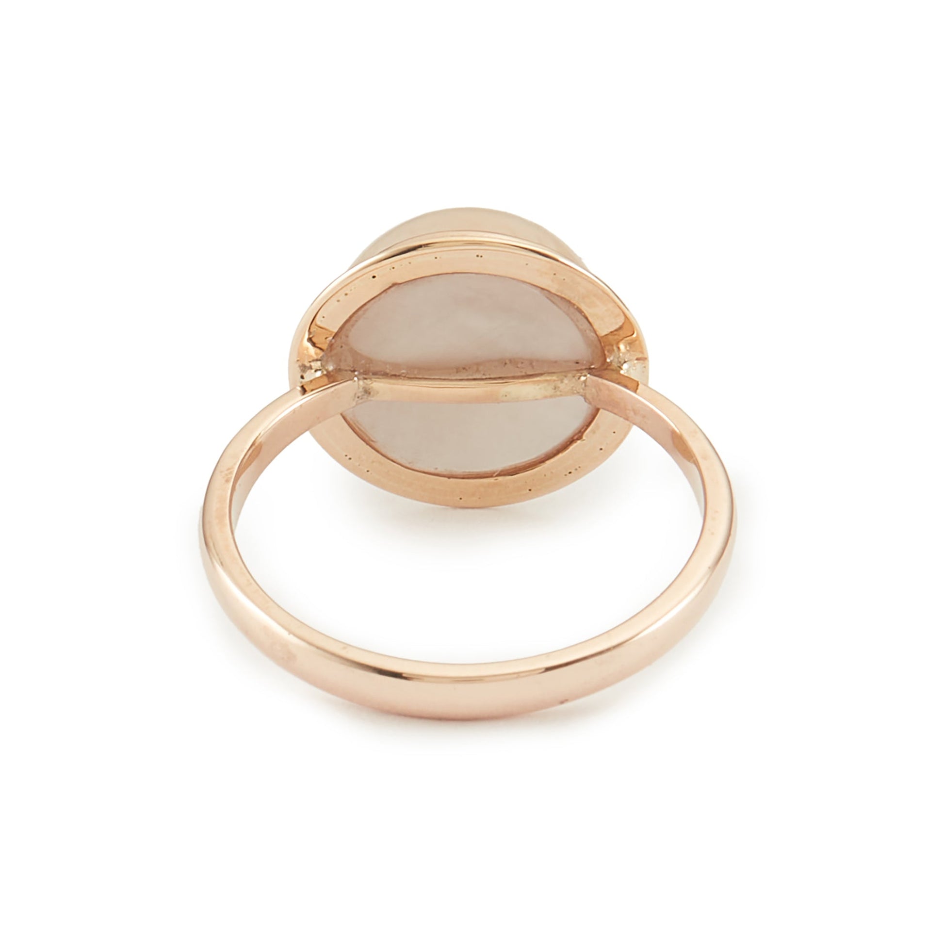 Classic 9ct rose gold ring with a lustrous mabe pearl in a tube setting.
