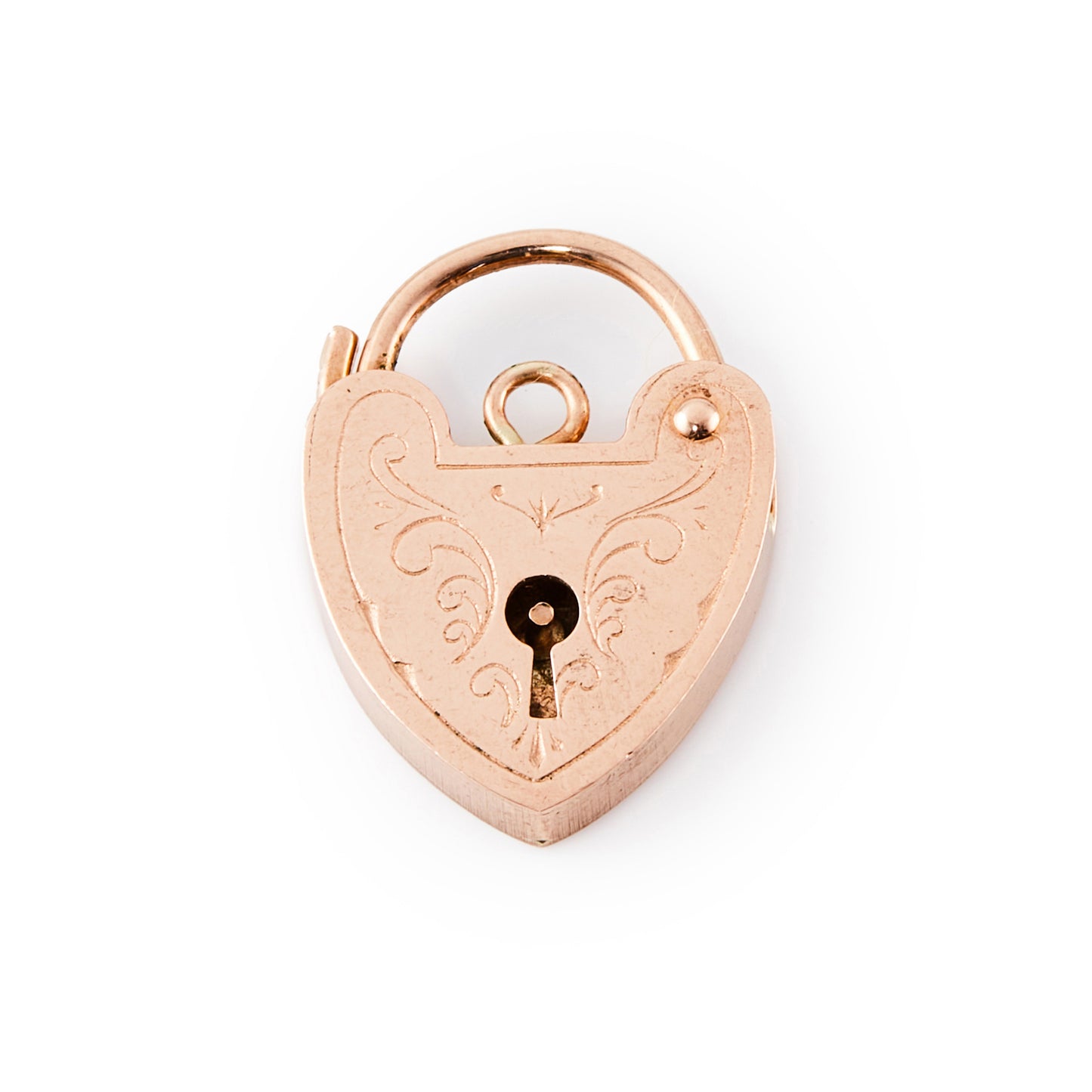 9ct rose gold padlock with ornate engraving on the front.