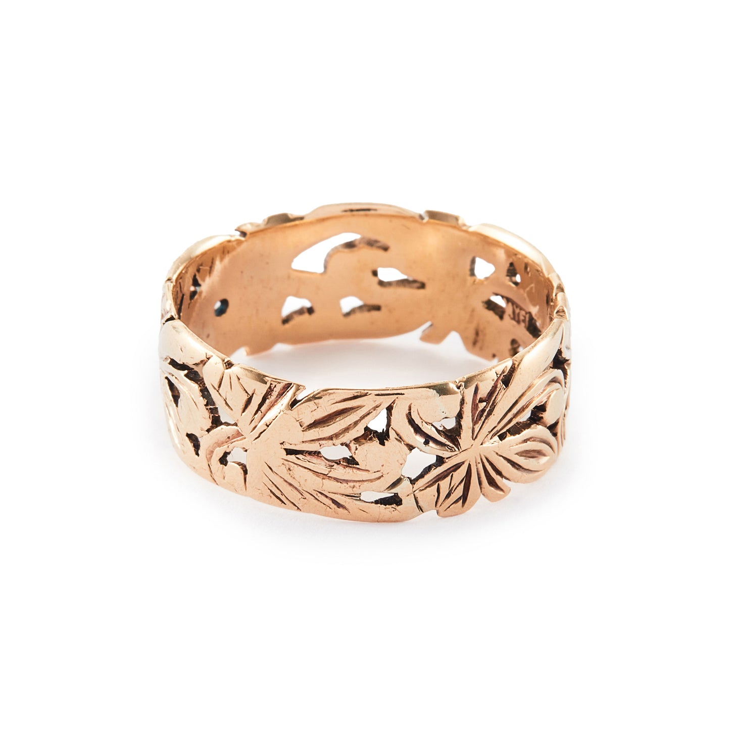 Intricate 9ct rose gold band featuring a lovely cut-out leaf design.