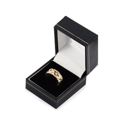 Intricate 9ct rose gold band featuring a lovely cut-out leaf design.