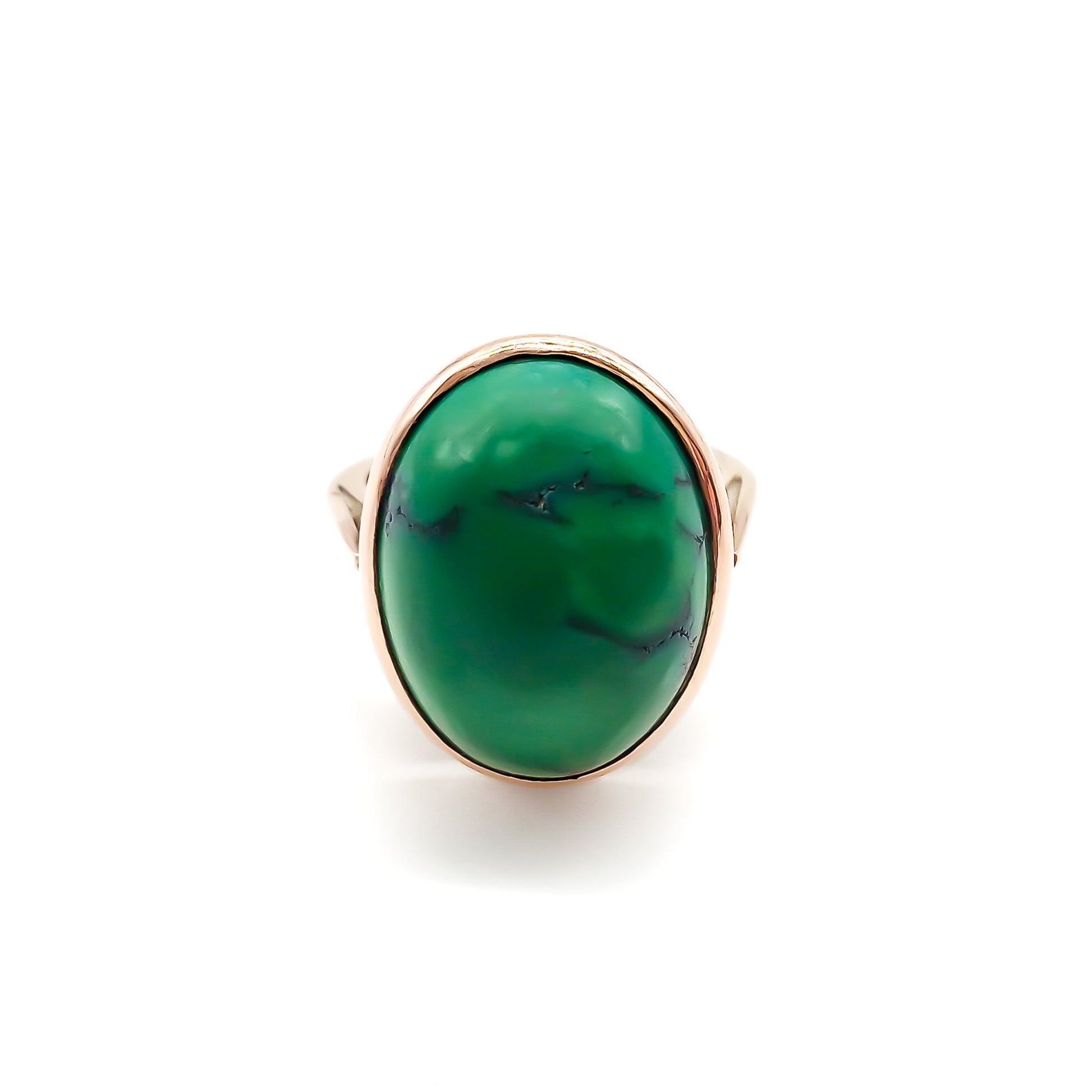 Stylish 9ct rose gold ring set with a beautiful oval cabochon green turquoise stone.