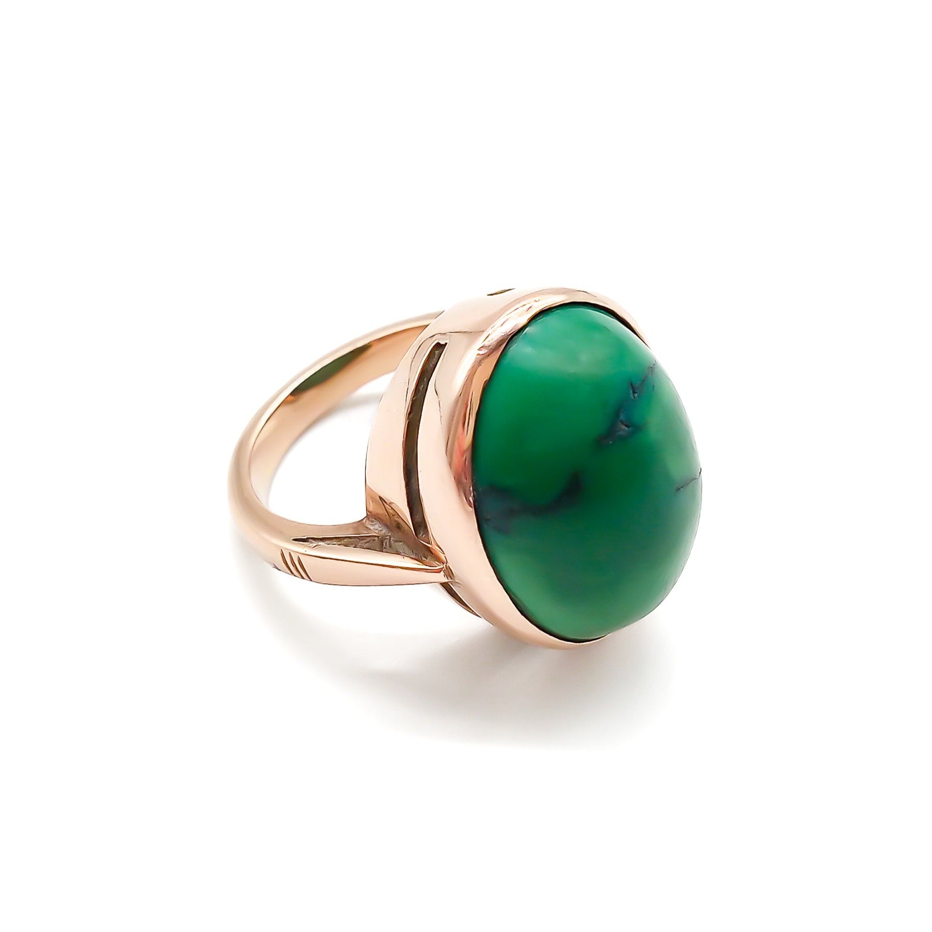 Stylish 9ct rose gold ring set with a beautiful oval cabochon green turquoise stone.