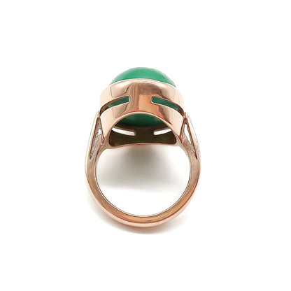 Stylish 9ct rose gold ring set with a beautiful oval cabochon green turquoise stone.